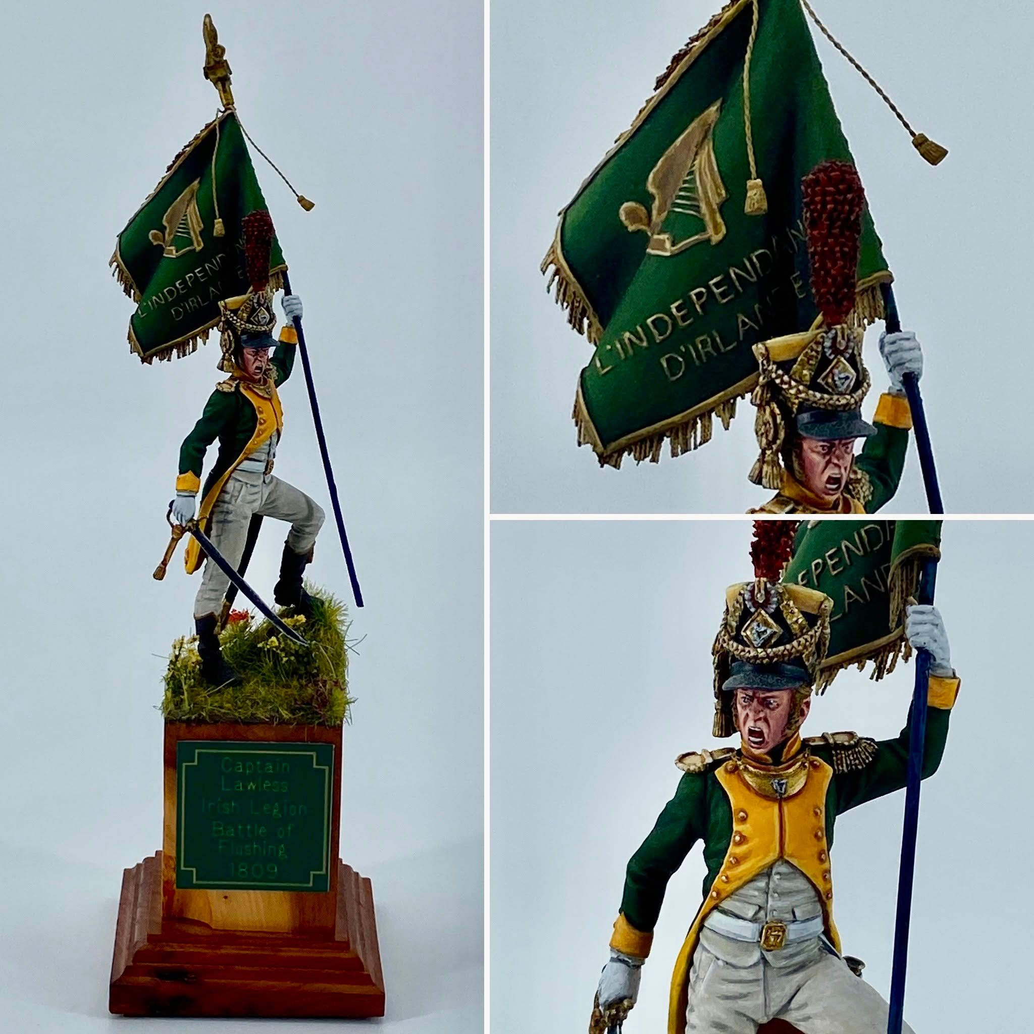 Figure of a Napoleonic officer in a green and yellow uniform shouting and raising a green regimental colour lettered L'Indépendance d'Irlande.